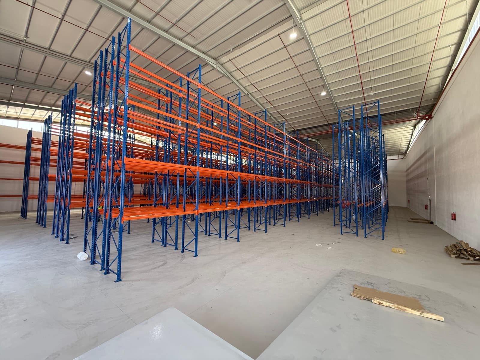 Warehouse fitted with steel pallet racking for goods